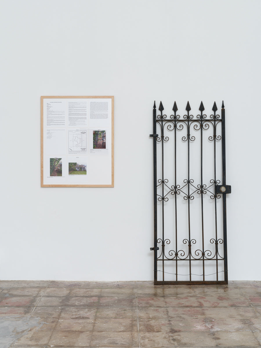 Artwork by Harrison Kinnane Smith, framed pages and iron gate